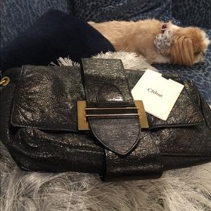 Chloe metallic black flap bag/gold tone chain